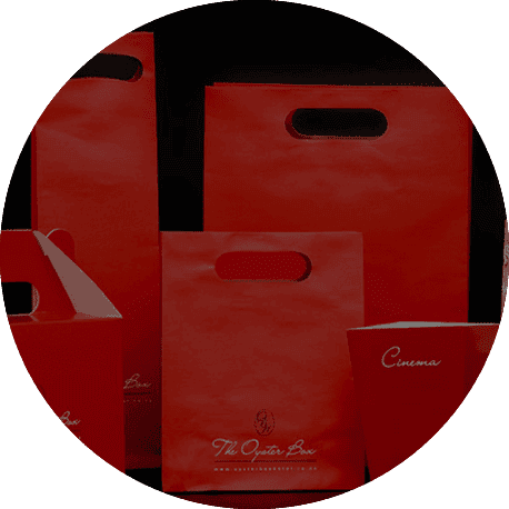 the oyster box red promotional bags in a circle