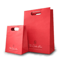 Customised paper bags - red the oyster box paper bags with cut out handles